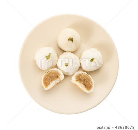 chinese pastry on white plate against white 48638678