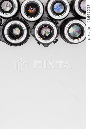 a lot of expensive photo lenses with for camera 48641233