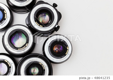 a lot of expensive photo lenses with for camera 48641235