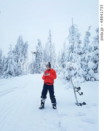 Snowboarder controls the drone Snowboarder controls the drone 48641735