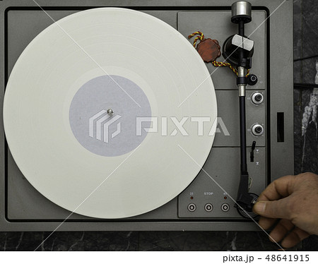Vintage vinyl turntable with vinyl plate. Listen to music. Top view. 48641915