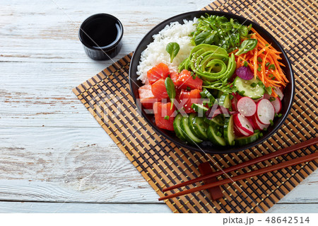 Raw Organic Ahi salmon Poke Bowl, closeup 48642514