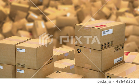 Hundreds of cardboard parcels lying on a heap 48643351