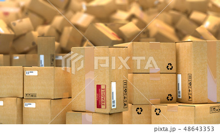 Hundreds of cardboard parcels lying on a heap 48643353