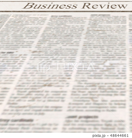 Newspaper with headline Business Review and news 48644661