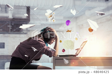 She is surfing the Internet She is surfing the Internet 48646425