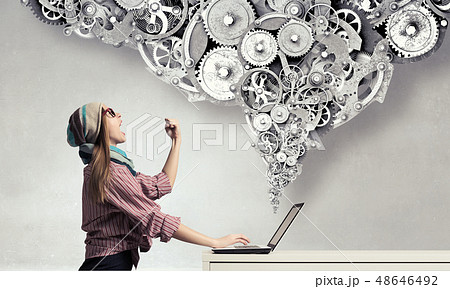 She is surfing the Internet She is surfing the Internet 48646492