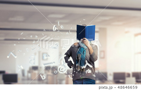 Student girl with book in hands 48646659