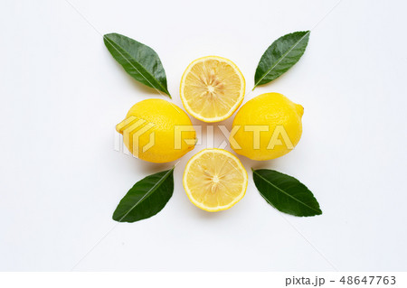 Lemon and slices with leaves isolated on white. 48647763