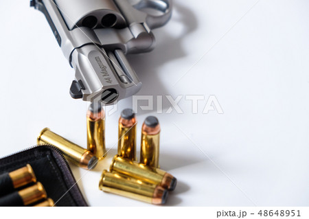 .44 magnum arm with metal bullet in leather bag 48648951