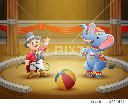 Circus ringmaster performs a trick along Circus ringmaster performs a trick along 48651601