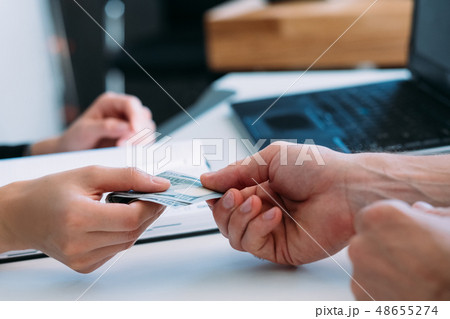 business workplace corruption cash money bribe 48655274