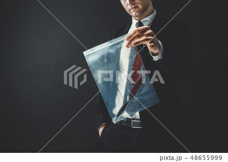 Officer showing a knife with blood as an evidence Officer showing a knife with blood as an evidence 48655999