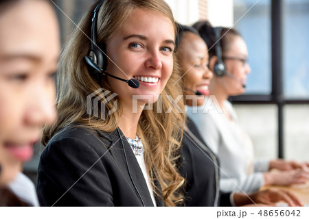 Woman customer service agent working in call Woman customer service agent working in call 48656042