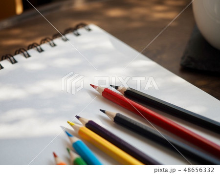 Sketchbooks, Colored Pencils And Coffee Stock Photo, Picture and Royalty  Free Image. Image 111635565.