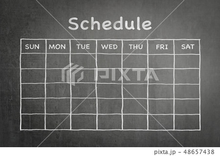 Schedule with grid timetable on black chalkboard 48657438