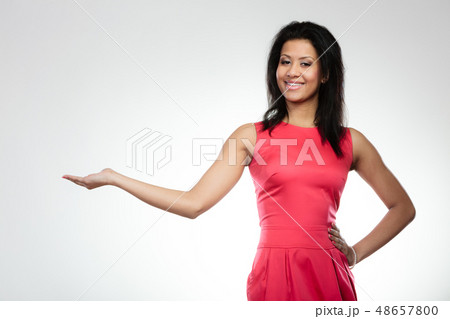 Girl mixed race holding open palm Girl mixed race holding open palm 48657800