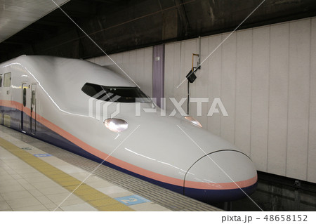 Shinkansen bullet train at Tokyo railway station 48658152