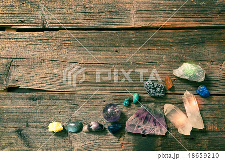 Multiple semi precious gemstones on board 48659210