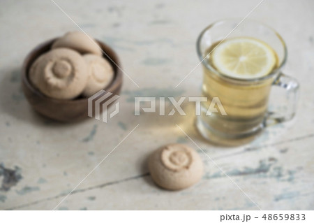 Blurred background with a glass of herbal tea and Blurred background with a glass of herbal tea and 48659833