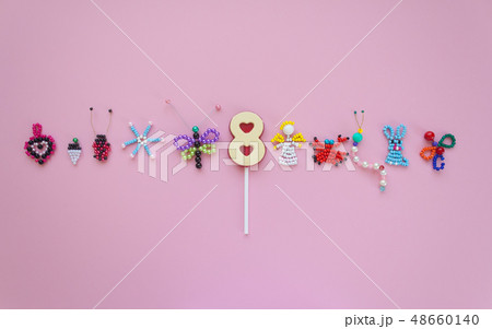 pattern of children's crafts on pink background. 48660140