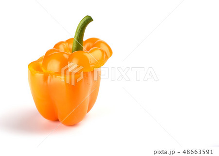 Orange bell pepper cut half on white background. Orange bell pepper cut half on white background. 48663591