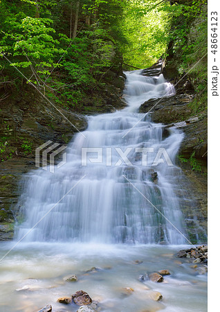 Waterfall in spring Waterfall in spring 48664123
