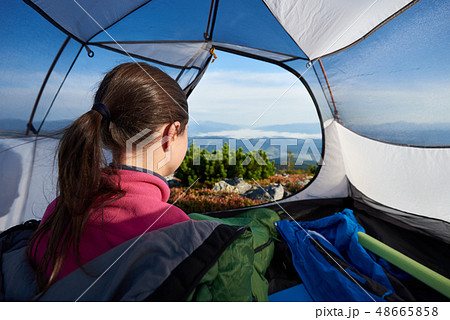 Camping on the top of mountain on bright summer morning 48665858