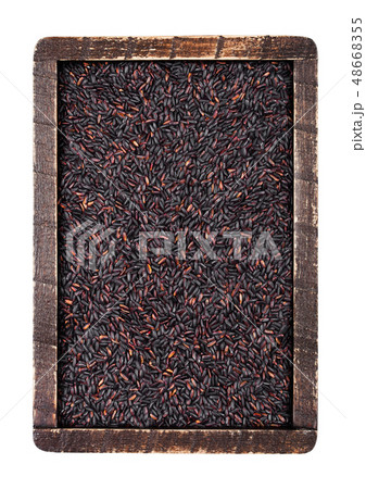 Wooden box of raw organic black venus rice on Wooden box of raw organic black venus rice on 48668355