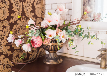 Classical vintage still life with artificial flowers Classical vintage still life with artificial flowers 48674472