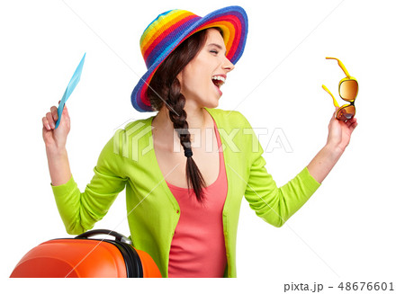 Portrait of female tourist with travel suitcase Portrait of female tourist with travel suitcase 48676601