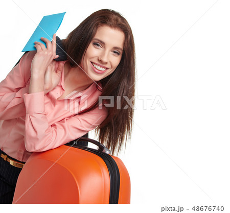 businesswoman with a suitcase and a ticket on a 48676740