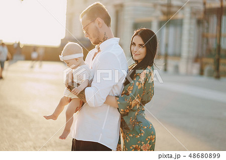 family in a town family in a town 48680899