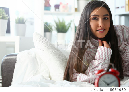 Indian woman in male shirt at home 48681080