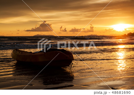 Canoe park on beach at Yai Bay, Koh Phayam, 48681690