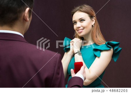 The girl looks in love with a man. 48682203