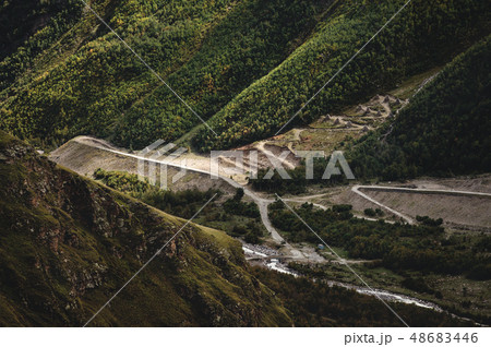 Landscape view of the gorge at the bottom of which the river flows and the road passes. Anti 48683446