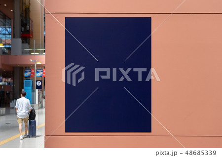Large blank billboard on a street wall, banners 48685339