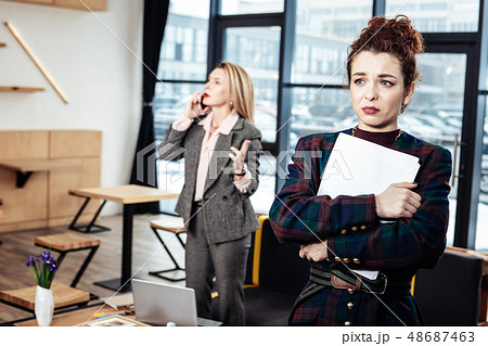 Young secretary leaving strict female boss almost crying Young secretary leaving strict female boss almost crying 48687463