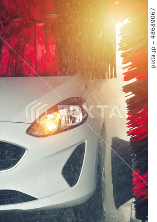 Automatic car wash in action. Car wash concept. Automatic car wash in action. Car wash concept. 48689067
