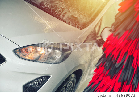 Automatic car wash in action. Car wash concept. Automatic car wash in action. Car wash concept. 48689073