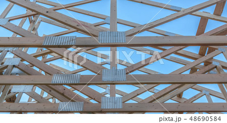 The horizontal beams of a wooden building pano The horizontal beams of a wooden building pano 48690584