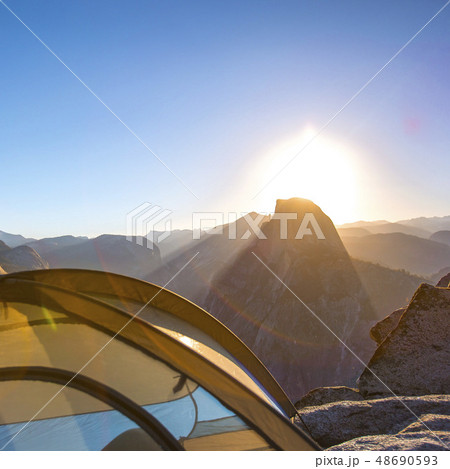 Tent overlooking Half Dome in Yosemite at sunrise Tent overlooking Half Dome in Yosemite at sunrise 48690593