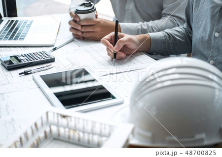 Team of engineering or architect meeting and discussing on bluep 48700825