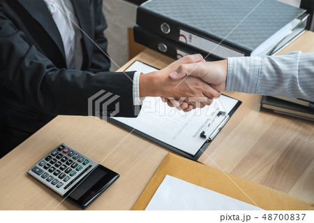 Handshake after finishing conversation Businessman sending a res Handshake after finishing conversation Businessman sending a res 48700837