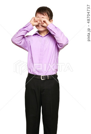 Boy posing on white background Boy posing on white background 48704737