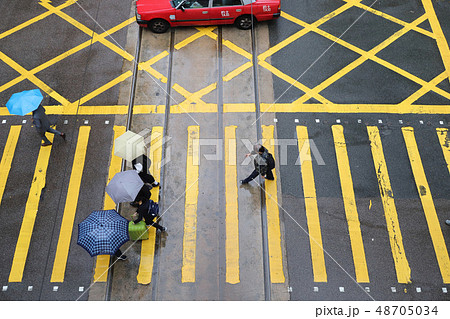 March 2019 , People cross road at rain day 48705034