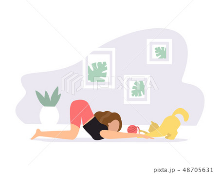 Extended puppy pose. Woman doing Yoga with cat 48705631