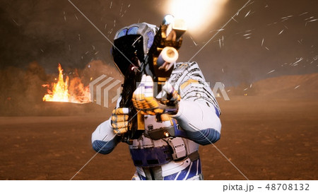 A lone soldier of the future on the battlefield attacks the enemy in the smoke in the middle of A lone soldier of the future on the battlefield attacks the enemy in the smoke in the middle of 48708132