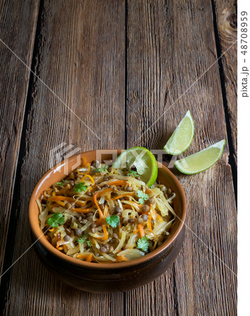 Red lentils with roasted cabbage and carrots. . 48708959